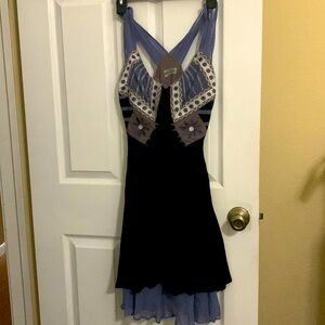 Pretty dress too small for me. Brand is Lafer size 6